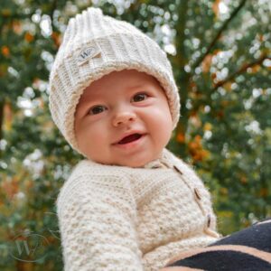wit gehaakt babyvestje van alpacawol